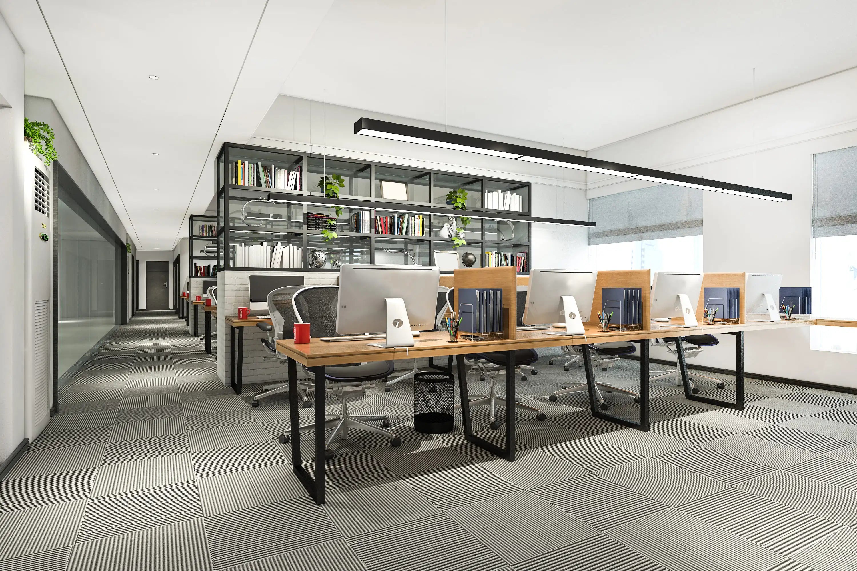 Espace de travail collaboratif avec bureaux en bois, mobilier ergonomique et étagère de séparation. Renobat conçoit votre aménagement bureau entreprise sur-mesure à Paris et Île-de-France.